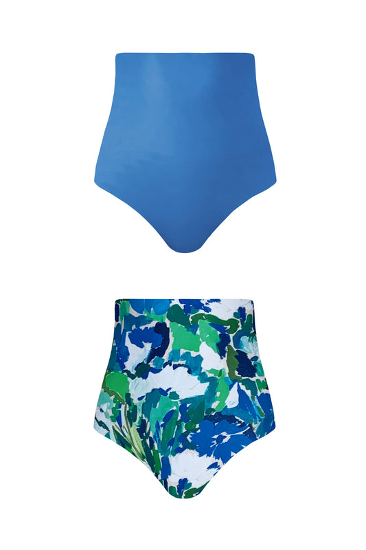 Product image showing each reversible side of the Monet bikini bottoms. One side shows the solid waterlily blue colour, the other features the vibrant print side composed of blue, green and creamy white hand-painted floral brush strokes.