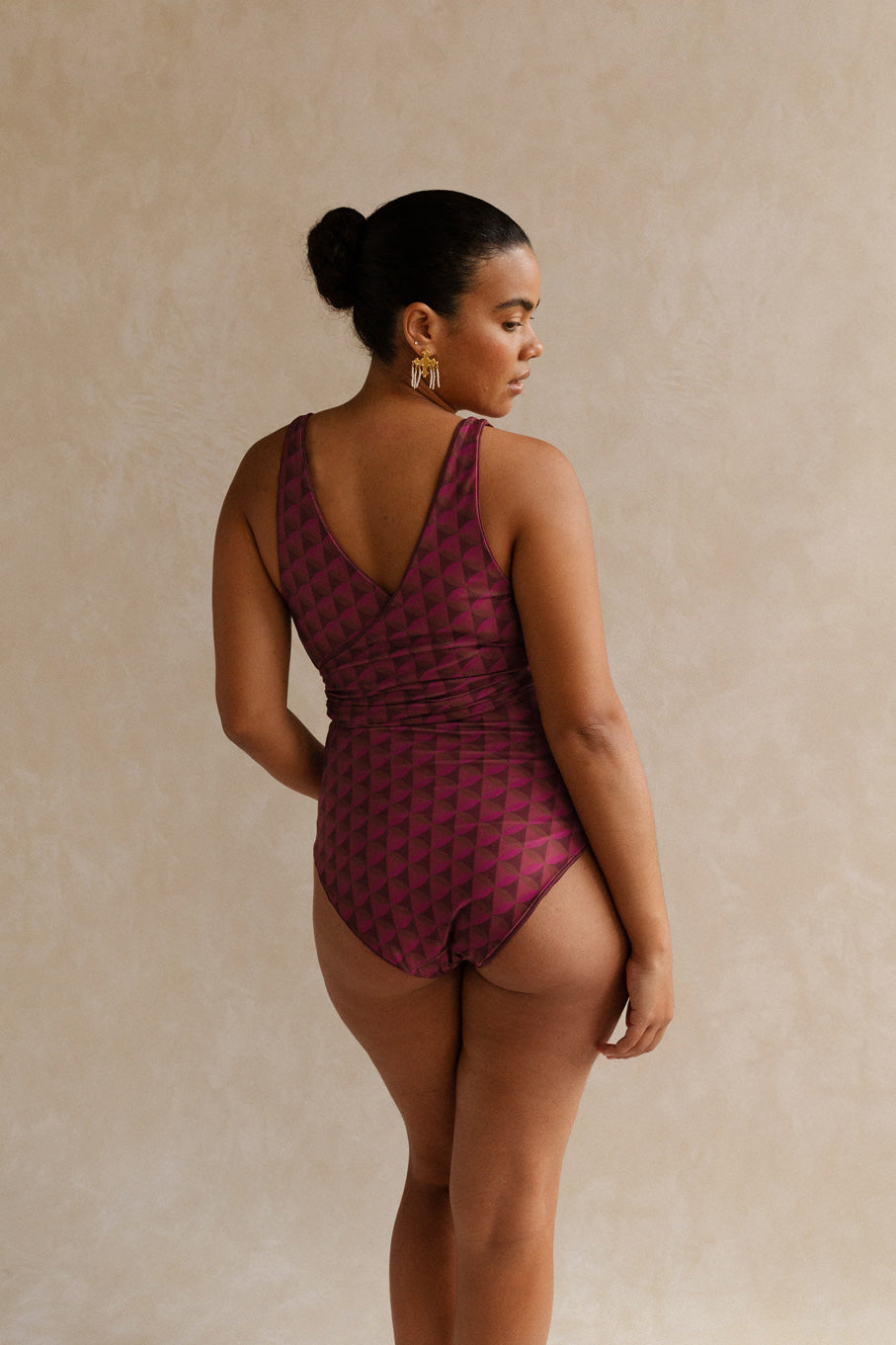 Back view of a woman wearing the Monroe bikini set, the angle showcases the flattering coverage provided.