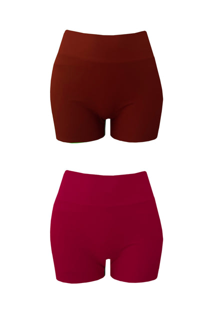 Product image showing each reversible side of the Andi swim shorts by Baiia. One side is a deep clay hue, whilst the other is rich raspberry.