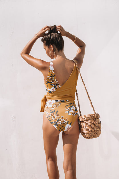 Bum coverage on floral mustard swimsuit